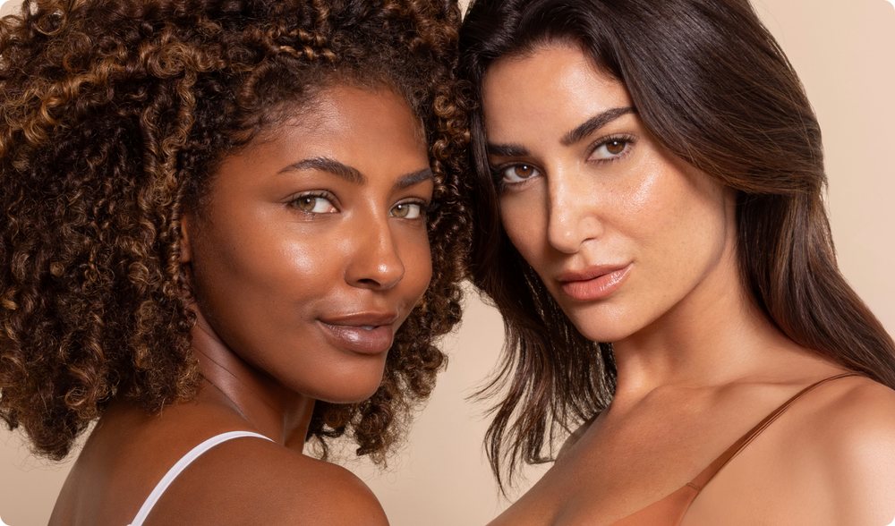 Two models side by side with radiant skin.