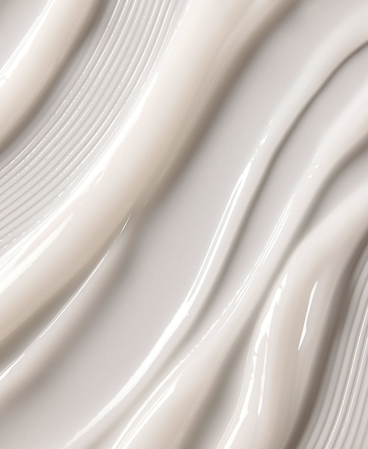 A close-up of glossy face cream