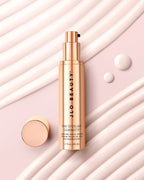 JLO Beauty That Spotlight Silhouette Firming Neck Tube with product droplets
