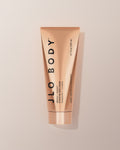 JLO BODY Hydrating BodyCream in a metallic rose gold squeeze tube