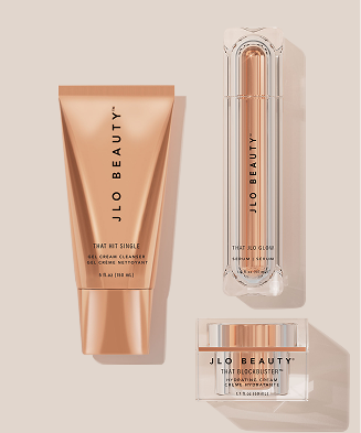 Three JLO Beauty skincare products arranged together 