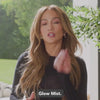 Video of a JLO misting her face with JLO Beauty Glow Mist.